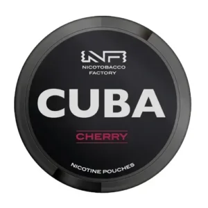 "A direct overhead view of a circular, black tin of Cuba Black Cherry Snus. The packaging features a sleek, industrial design with the 'NF Nicotobacco Factory' logo centred at the top in white. The brand name 'CUBA' dominates the centre in large, bold white letters, creating a sharp contrast against the matte black background. Below this, the flavour name 'CHERRY' is printed in a deep, vibrant pinkish-red font, visually evoking the refreshingly intense burst of ripe cherry taste and the balance of sweetness and tanginess described in the flavour profile. The text 'NICOTINE POUCHES' curves along the bottom edge, and the overall dark aesthetic conveys the product's classification as an 'extremely strong' nicotine pouch containing 43mg of nicotine, designed for those craving a stronger kick."
