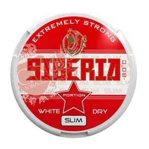 A direct overhead view of a circular tin of Siberia White Dry Slim Snus, characterized by its aggressive red and white colour scheme. The top of the lid features the text 'EXTREMELY STRONG' curving above a fierce, roaring bear illustration, visually symbolizing the exhilarating rush and powerful 27.95mg nicotine hit. The brand name 'SIBERIA' spans the centre in a jagged, Gothic-style red font, adjacent to the text '-80°C,' which evokes the refreshing, invigorating mint flavour and cooling sensation described in the profile. A white band behind the logo features a repeating 'SLIM' pattern, while the bottom section displays a large red star flanked by the words 'WHITE' and 'DRY.' A distinct 'SLIM' label sits at the very bottom, identifying the pouch format.