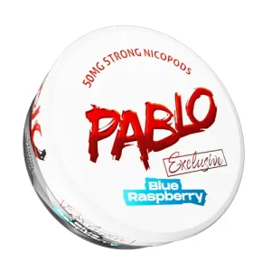 A detailed, angled studio shot of a circular white can of Pablo Exclusive Blue Raspberry Snus. The packaging is dominated by the brand's signature large, distressed blood-red "PABLO" typography in the centre, with "Exclusive" written in refined script below it. Arched across the top in red text is "50MG STRONG NICOPODS," clearly indicating the extremely strong nicotine content mentioned in the product details. The flavour name, "Blue Raspberry," is displayed at the bottom on a vibrant, jagged bright blue banner, visually evoking the electrifying essence and tangy zest of ripe blue raspberries mixed with a bold wave of icy coolness found in these tobacco-free nicopods.