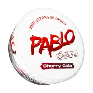 A detailed, angled studio shot of a circular white can of Pablo Exclusive Cherry Cola Snus. The packaging is dominated by the brand's signature large, distressed blood-red "PABLO" typography in the centre, with "Exclusive" written in refined script below it. Arched across the top in red text is "50MG STRONG NICOPODS," clearly indicating the extremely strong nicotine content. The flavour name, "Cherry Cola," is displayed at the bottom on a jagged gradient banner transitioning from deep red to dark brown, visually representing the blend of the sweet tang of ripe cherries and the classic fizz of cola found in these tobacco-free nicopods.