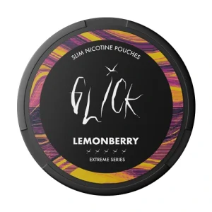 A top-down view of a round, black tin of Glick Extreme Lemonberry snus. The lid features a central black circle showcasing the brand name "GLICK" in jagged, white graffiti-style lettering, positioned above the flavour name "LEMONBERRY" and the text "EXTREME SERIES," accompanied by a row of small bird icons. The central design is ringed by a vibrant, swirling marble pattern of yellow and purple, visually evoking the zesty citrus and sweet strawberry blend found in the 20 slim nicotine pouches inside. This packaging represents the product's moderate strength profile with 20mg/g nicotine, offering a bold and satisfying experience.